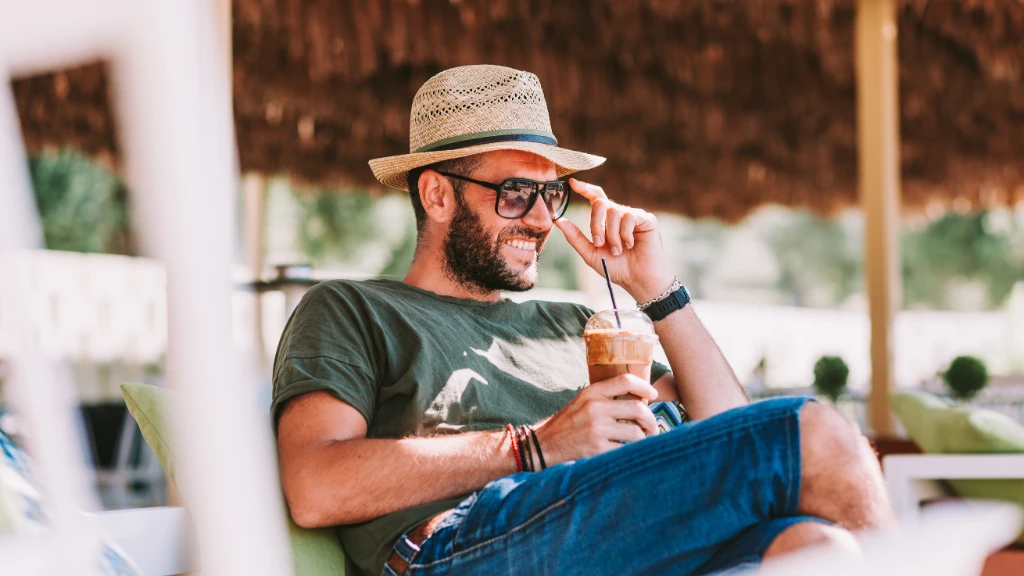 Man drinking iced coffee.jpg